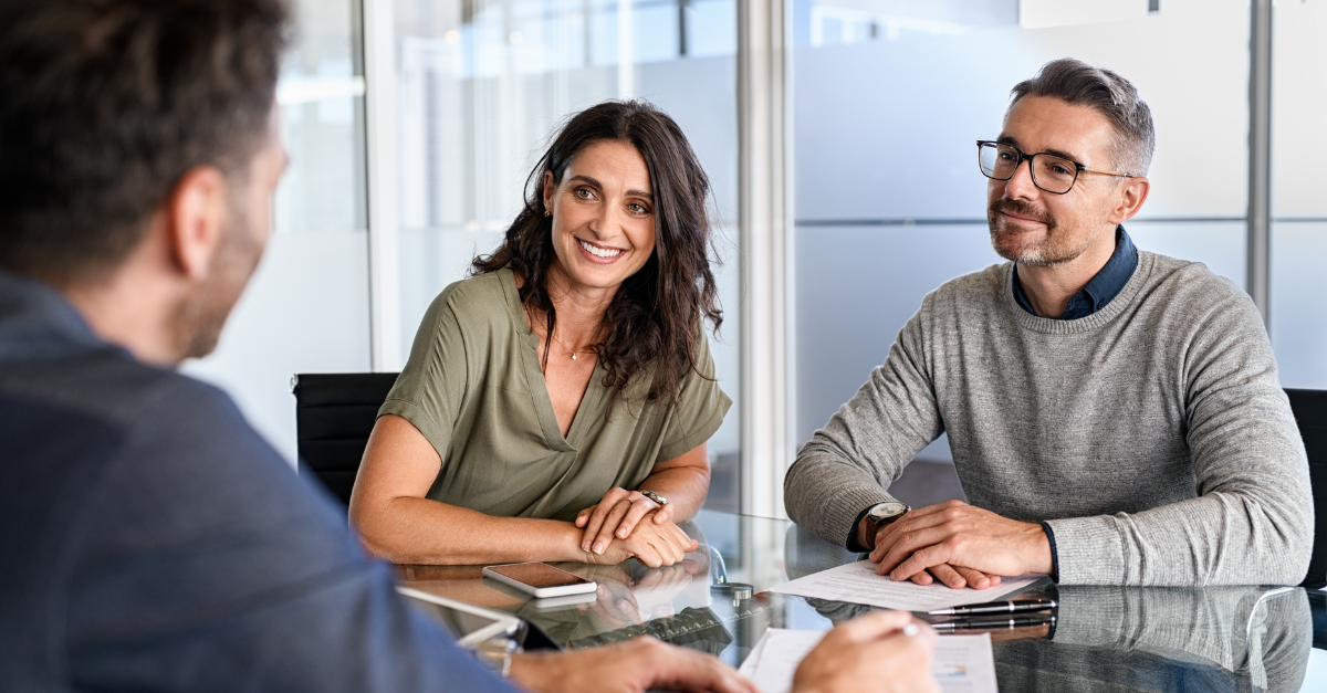 Couple Meeting Financial Advisor For Investment